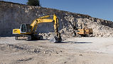 Excavator and loader at quarry site