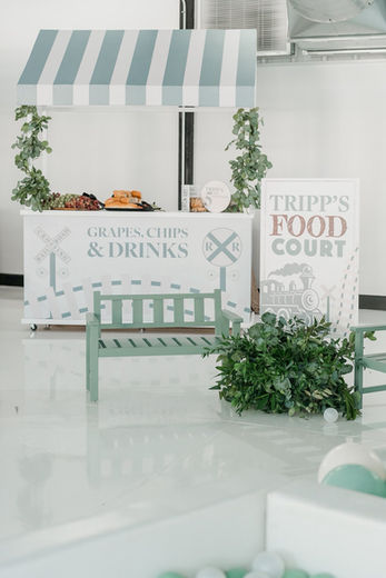 Tripp's Food Court stand with striped awning, Sweet Treats