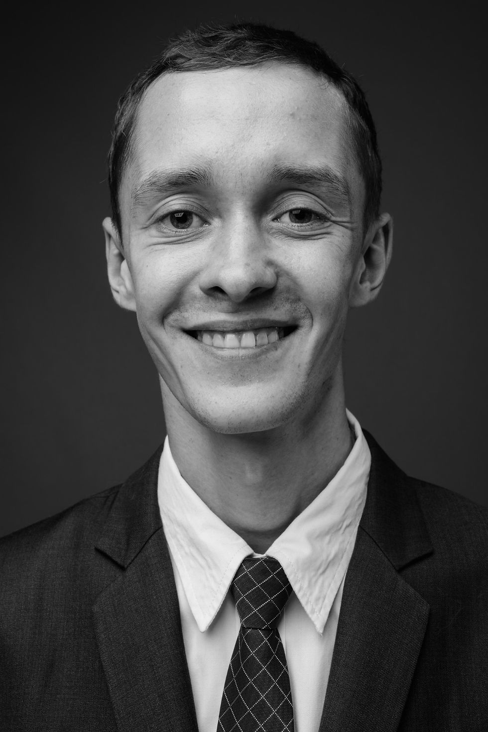 Black and white portrait of smiling man