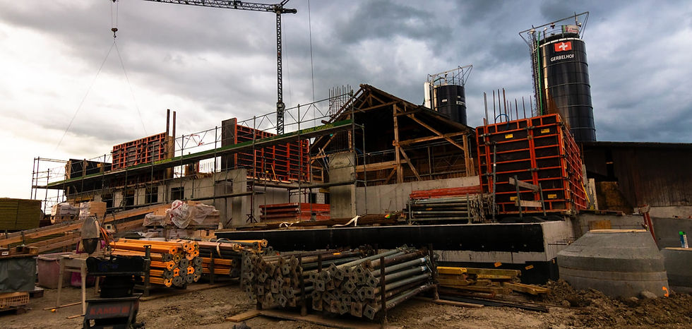 Construction site with crane, building under construction