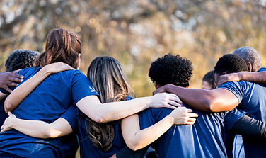 Community in a circle hugging