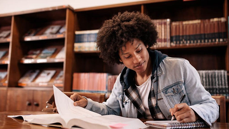 black-male-student-working-library-e1627688198213.jpeg