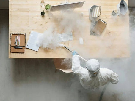 a man cleaning office 