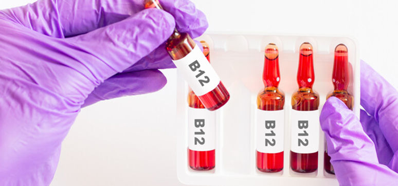 A close-up image of B12 injection vials, ready for use in boosting energy and supporting overall health through vitamin B12 supplementation.