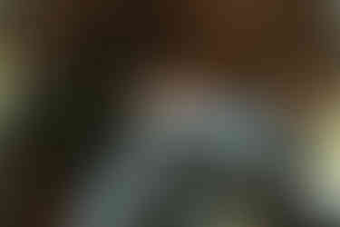 Slow wedding weekend morning on a Tennessee cabin porch with coffee.