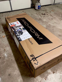 Unboxing treadmill for assembly