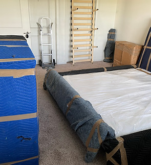 Bedroom disassembled, wrapped, packed and ready to go