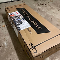 Proform treadmill in box before assembly.