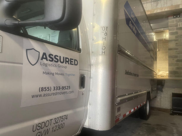 Assured Logistics Group truck at Icon Riverwalk in Plainsboro NJ