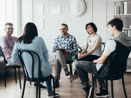 Woman receiving betrayal trauma recovery support through coaching and group healing after relationship betrayal.
