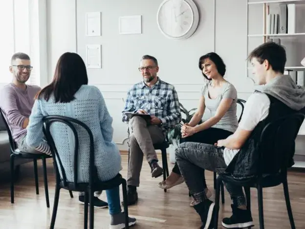 Woman receiving betrayal trauma recovery support through coaching and group healing after relationship betrayal.