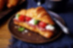 Cheese and parma ham croissant
