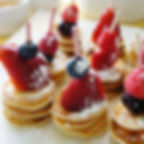 Mini pancake with fruit and maple syrup