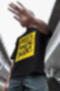 oversized-t-shirt-mockup-of-a-man-posing-in-the-street-while-covering-his-face-m38286 (1).