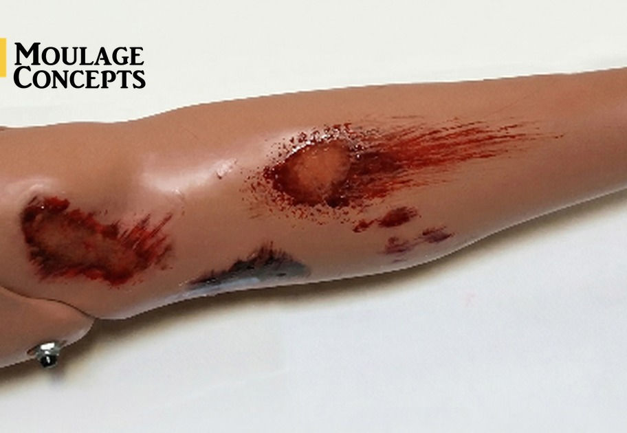 MasterCast 3D tattoos by Moulage Concepts on simulator leg