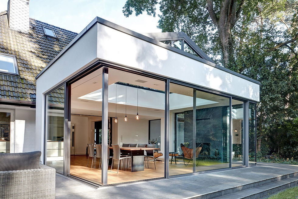 Contemporary home extension, with large sliding glass doors, offering a nice open plan space