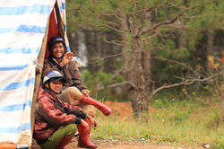 Smiling Drivers in Tent