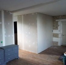 Creating an ensuite bathroom and dressing area in a master bedroom.