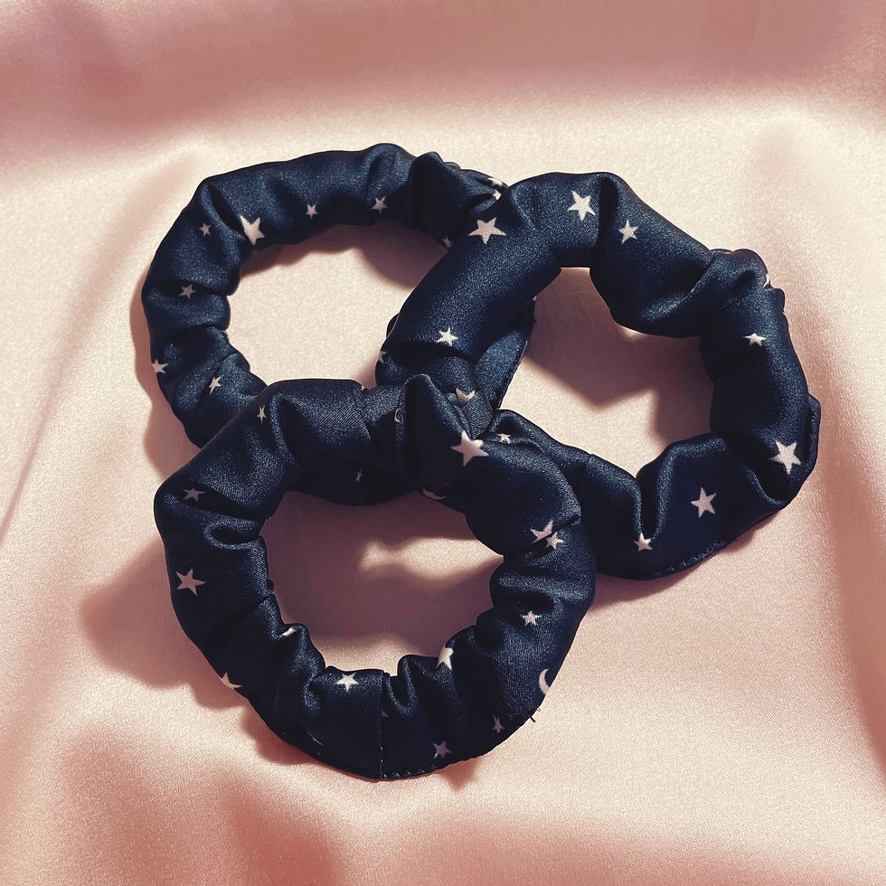 Thumbnail: Three navy blue silk mini scrunchies with white star and moon print