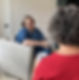 woman sitting on sofa coaching another woman