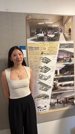 About Me Presenting Photo.JPG