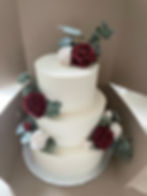 White & Burgundy Wedding Cake