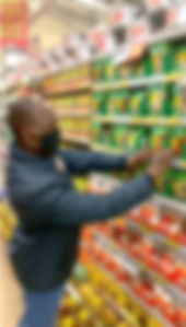 LDS merchandiser arranging FMCG products on retail shelves in Lesotho