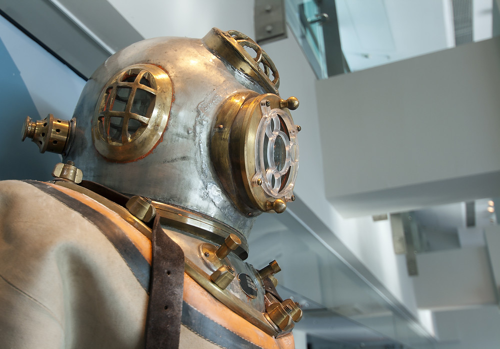 Historical dive suit with a steel and copper dive helmet