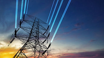 Close up bottom view electricity overhead power lines on sunset sky in Jakarta Indonesia,