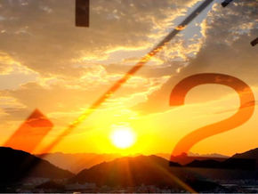 Time-lapse of a sunset over a city beneath distant mountains, with a large, semi-transparent clock face superimposed over the sky to show time rapidly passing — symbolising the cost of waiting and missed opportunities for midlife career change from a blog post by Patricia Ezechie