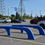 Thumbnail: RTS Retail blue rotomolded large plastic and steel cart corral in parking lot