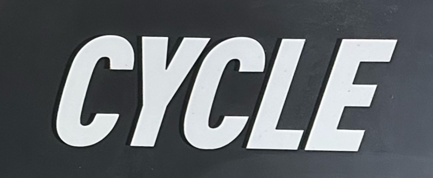 sign from outside spin room that says cycle