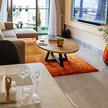 View of the living area from the open planned kitchen at Asili Crest Group's Riara One Residency apartments