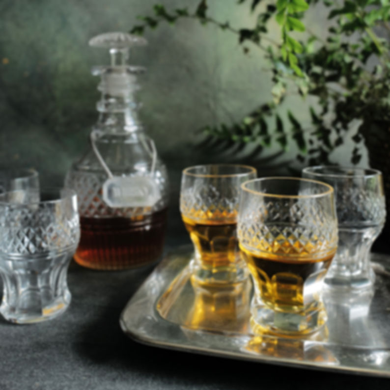 A Set of Six Edwardian Cut Crystal Whisky Tot Glasses