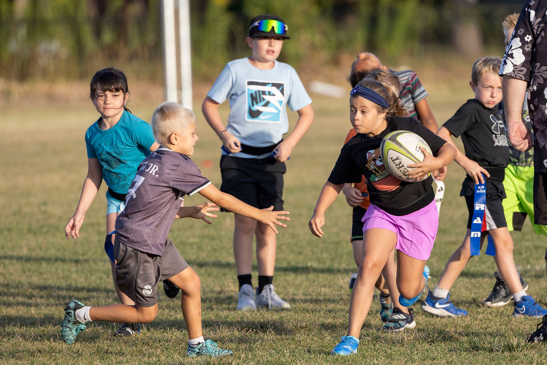 Kenmore player evades a tag