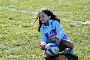A Kenmore Rugby player scores in a minigame
