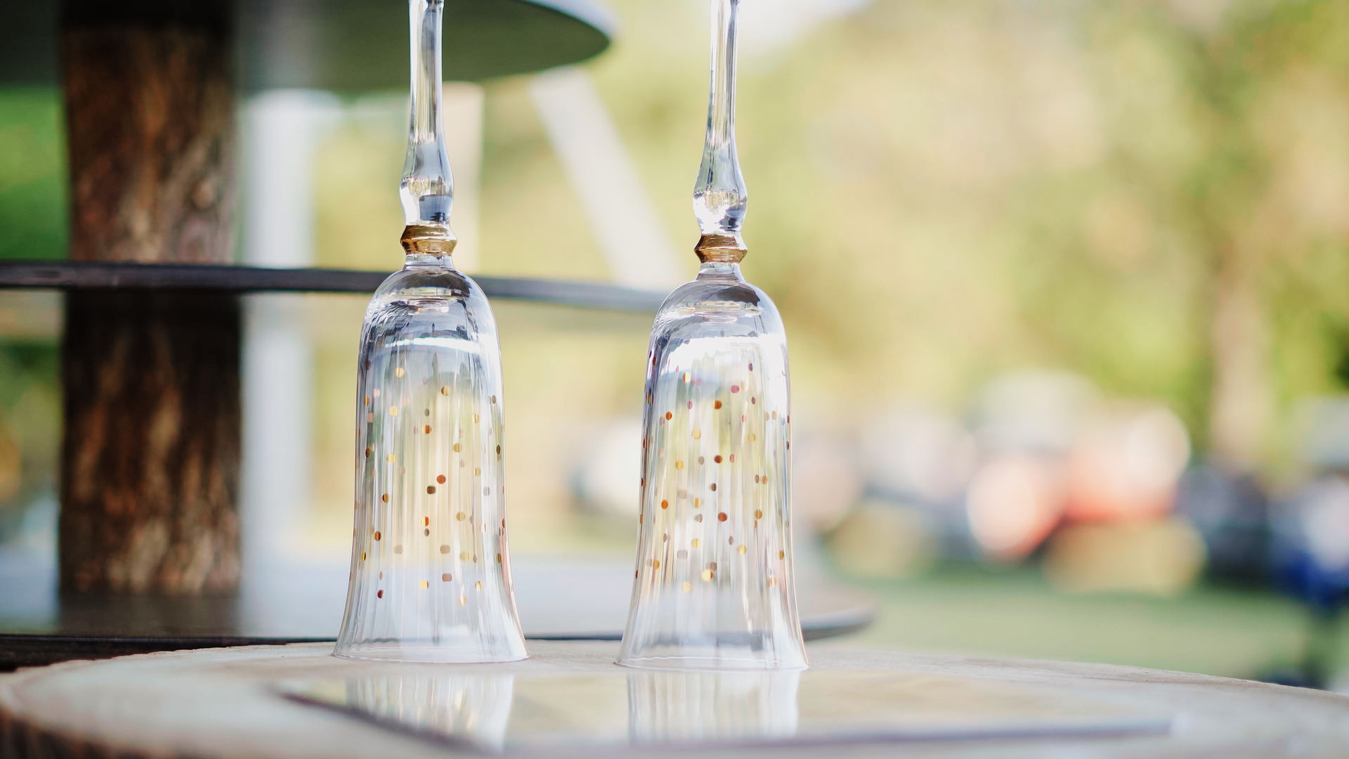 Decorative champagne glasses for bride and groom at wedding celebration