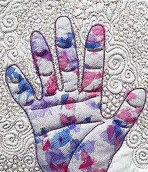 machine embroidery sample for workshop with quilting and trapped fabrics