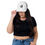 Thumbnail: Woman wearing TennisMoon Smile Trucker Cap in white, front view.