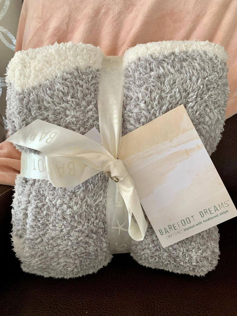 This Barefoot Dreams Throw is the one we are fight over!!! 🤣😂 It's sooo soft and cozy.