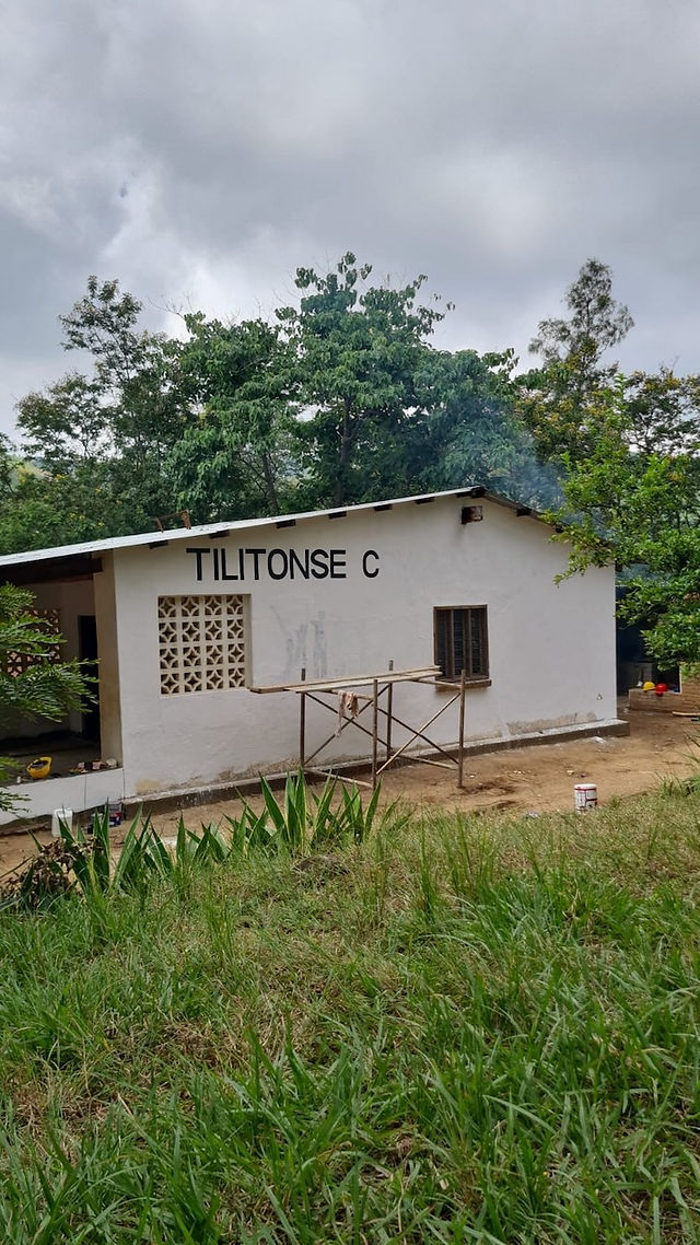 Side wall of Tilitonse Community Centre being repainted