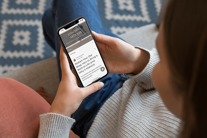mockup-of-a-girl-sitting-on-a-couch-using-her-iphone-xs-25355 copy.png