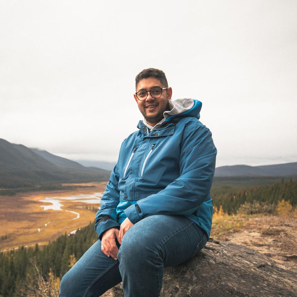 Edmar Xavier sit at Willmore Lookout enjoying the view.