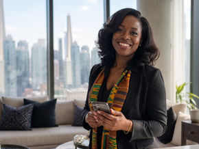 Ghanaian marketing professional in Toronto celebrating her Canadian Experience Class PR approval