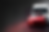 2 front view of a red 2025 car over a 90% black background placed on the lower right corne