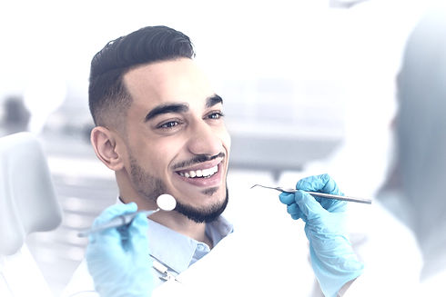 Smiling Man at Dentist_edited.jpg