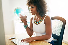 young-businesswoman-drinking-water-2022-02-02-05-07-25-utc.jpg