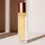 Miniaturbild: Noelie Grow & Shine Volume Gel in elegantem Design mit goldfarbenem Deckel, beleuchtet im natürlichen Sonnenlicht.