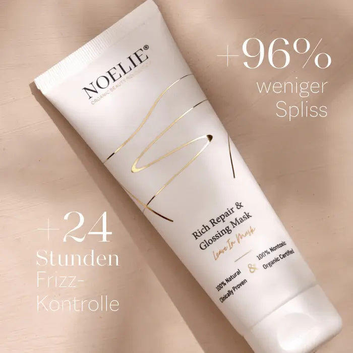 Miniaturbild: NOELIE Rich Repair & Glossing Mask mit Angaben zu 96 % weniger Spliss und 24 Stunden Frizz-Kontrolle auf hellen Hintergrund