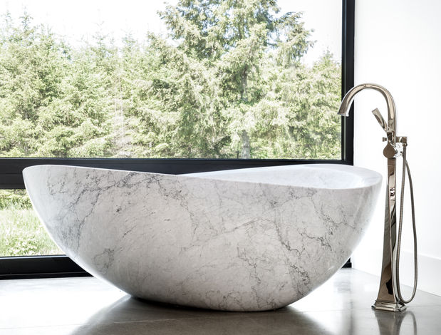 Massive Marble Bath Next to Ceiling Tall Window overlooking the Forest